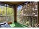 Relaxing screened patio with green turf flooring and views of lush landscaping at 4833 Cypress Woods Dr # 4205, Orlando, FL 32811