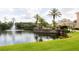 Scenic pond with fountain and lush landscaping creating a serene environment at 4833 Cypress Woods Dr # 4205, Orlando, FL 32811