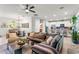 Open concept living room features seamless transition to the kitchen, perfect for entertaining and gatherings at 489 Grape Ave, St Cloud, FL 34769