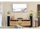 Stylish living room features modern entertainment center and decor at 489 Grape Ave, St Cloud, FL 34769