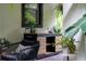 Cozy outdoor seating area with stylish furniture and lush plants at 489 Grape Ave, St Cloud, FL 34769