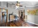 Spacious office featuring hardwood floors, lots of natural light, and a ceiling fan at 526 Sabal Trail Cir, Longwood, FL 32779