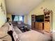 Comfortable living room with high ceilings, hardwood floors, and a large sectional sofa at 5395 Vineland Rd # S, Orlando, FL 32811