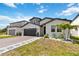 Attractive home with a brick driveway and well-maintained landscaping at 5639 Timber Meadow Way, St Cloud, FL 34771