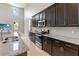 Kitchen with granite countertops and stainless steel appliances at 5639 Timber Meadow Way, St Cloud, FL 34771