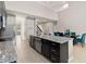 Well-lit kitchen featuring a large island, stainless steel appliances, and open layout at 5639 Timber Meadow Way, St Cloud, FL 34771