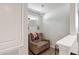 Quiet loft nook with a cozy chair and a peaceful atmosphere at 5639 Timber Meadow Way, St Cloud, FL 34771