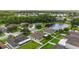 A neighborhood with single-Gathering homes, ponds, and mature trees providing a natural scenic setting at 6005 Coal Ct, St Cloud, FL 34772