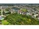 Desirable neighborhood featuring a lake, mature trees, and well-maintained lawns at 6005 Coal Ct, St Cloud, FL 34772