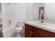 Bright bathroom featuring vanity and shower-tub combination at 6005 Coal Ct, St Cloud, FL 34772