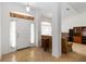 Welcoming foyer with tiled floors, a decorative light fixture, and views into the living area at 6005 Coal Ct, St Cloud, FL 34772