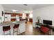 Inviting kitchen features updated appliances, ample counter space, and eat-in breakfast bar at 6005 Coal Ct, St Cloud, FL 34772