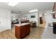 Spacious kitchen includes modern appliances, center island, and wood-look flooring at 6005 Coal Ct, St Cloud, FL 34772