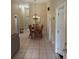 Bright dining room features tile flooring, high ceilings and a chandelier at 7104 Blue Earth Ct, Orlando, FL 32818