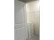 Organized walk-in closet featuring built-in drawers and shelving for ample storage space at 7172 Sw 135Th Pl, Ocala, FL 34473