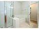 Bathroom featuring a separate shower and soaking tub with tile surround at 7214 Tattant Blvd, Windermere, FL 34786