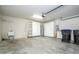 Spacious garage with white cabinets, a utility sink and storage space at 7214 Tattant Blvd, Windermere, FL 34786