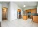 Spacious kitchen features stainless steel appliances and a functional center island at 7214 Tattant Blvd, Windermere, FL 34786