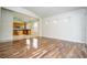Inviting living room with hardwood floors and an open view to the kitchen at 7214 Tattant Blvd, Windermere, FL 34786
