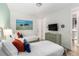Charming bedroom with twin beds, nautical decor and stylish furnishings at 884 Golden Bear Dr, Reunion, FL 34747