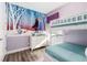 bedroom with bunk beds, cartoon mural, dresser and pastel colors at 884 Golden Bear Dr, Reunion, FL 34747
