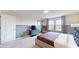 Well-lit bedroom with stylish decor and ample space, creating a relaxing atmosphere at 8900 Sydney Ave, Kissimmee, FL 34747