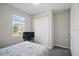 This bedroom features a window and a closet for plenty of storage at 914 Fallon Hills Dr, Haines City, FL 33844