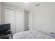 Bedroom features a built in closet and neutral color scheme with gray carpet at 914 Fallon Hills Dr, Haines City, FL 33844
