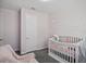 This Bedroom features pale pink walls with white trim at 914 Fallon Hills Dr, Haines City, FL 33844