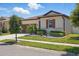 Beautifully landscaped front yard with decorative stone and lush green shrubs at 914 Fallon Hills Dr, Haines City, FL 33844