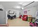 Large garage offers ample storage space and potential for a workshop area, with room for multiple vehicles at 914 Fallon Hills Dr, Haines City, FL 33844
