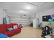 A well-lit garage featuring a modern overhead door, providing secure parking and storage solutions at 914 Fallon Hills Dr, Haines City, FL 33844