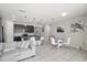 Stylish living area with an open kitchen, perfect for entertaining guests at 914 Fallon Hills Dr, Haines City, FL 33844