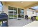 Outdoor patio with a grill and outdoor seating area at 914 Fallon Hills Dr, Haines City, FL 33844