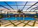 Beautiful pool featuring fire bowls, a spa, and a scenic view at 9352 Santorini Dr, Orlando, FL 32827