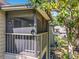 A quaint screened balcony providing a private outdoor space to enjoy the view at 950 Bird Bay Ct # 206, Lake Mary, FL 32746