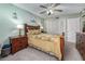 Comfortable bedroom featuring a ceiling fan, wardrobe and natural light at 1000 S Semoran Blvd # 604, Winter Park, FL 32792