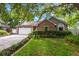 Charming single-Gathering home with well-manicured lawn and attached two-car garage at 1010 Leinhart Ct, Oviedo, FL 32765