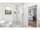 Updated bathroom with glass shower, decorative tile, and natural light at 112 E Spruce St, Orlando, FL 32804