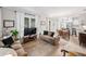 Bright and airy living room with an open layout flowing into the kitchen and dining areas at 112 E Spruce St, Orlando, FL 32804