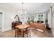 Spacious living area with hardwood floors, great natural light, and open floor plan at 112 E Spruce St, Orlando, FL 32804