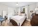Spacious bedroom featuring wood floors, natural light, and neutral color scheme at 112 E Spruce St, Orlando, FL 32804