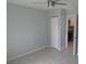 Bedroom featuring tile flooring, ceiling fan, and closet at 1600 Roosevelt Ave, Orlando, FL 32804