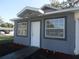 Charming home featuring a new landscape design, updated windows, and a freshly painted exterior at 1600 Roosevelt Ave, Orlando, FL 32804