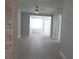 Light-filled living room featuring gray walls and wood-look flooring at 1600 Roosevelt Ave, Orlando, FL 32804