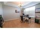 Office area featuring tile floors, desk, and window at 1780 Nature Cove Ln, Clermont, FL 34711
