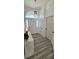 Bright entryway features wood-look floors and ample natural light from the front door at 1930 Dolphin Drive, Kissimmee, FL 34759