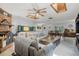 Inviting living space with fireplace, updated flooring, and a comfortable seating area at 220 Morton Ln, Winter Springs, FL 32708