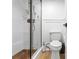 Bathroom featuring a glass shower enclosure and modern toilet at 2485 Lakeway Branch Dr # 2105, Orlando, FL 32839