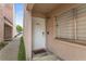 Charming front door featuring the house number '2485' with a window and small garden at 2485 Lakeway Branch Dr # 2105, Orlando, FL 32839